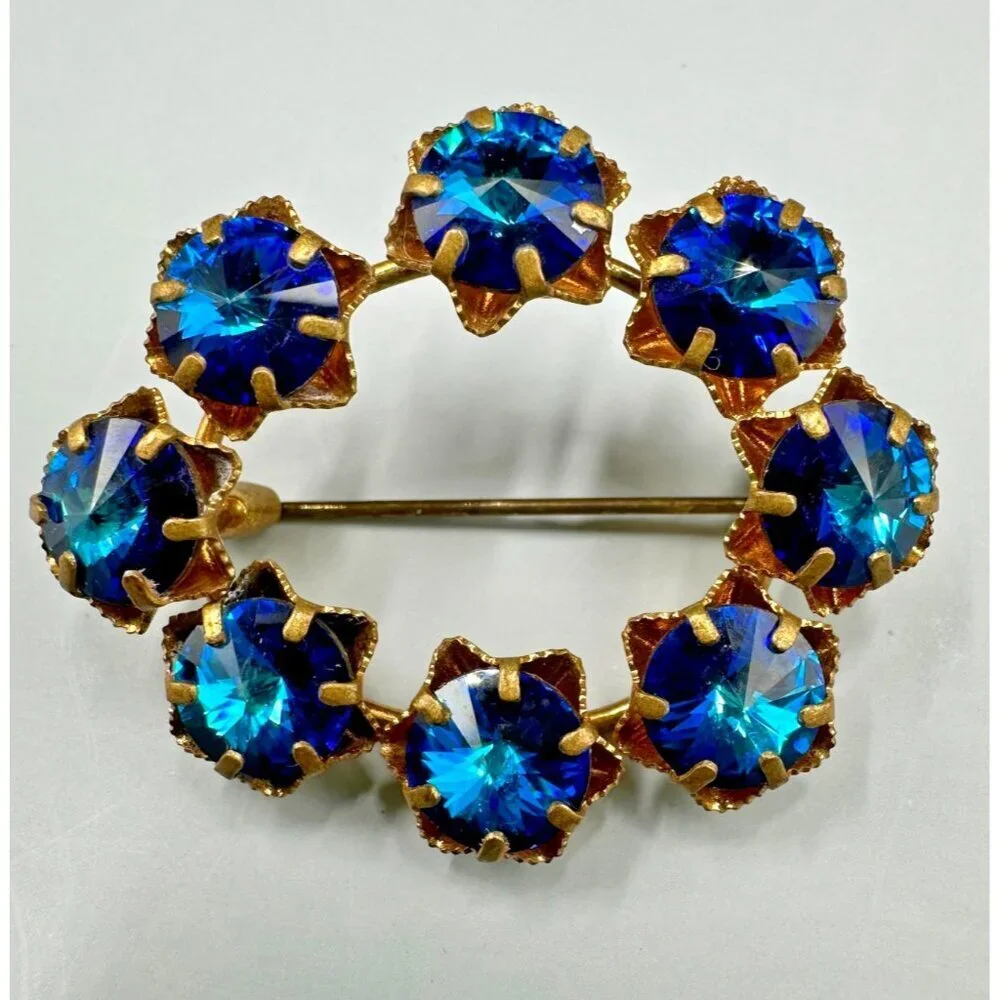 Vintage Austria Brooch Blue Rivoli Rhinestone Gold Tone Wreath Oval 1.25 Inch